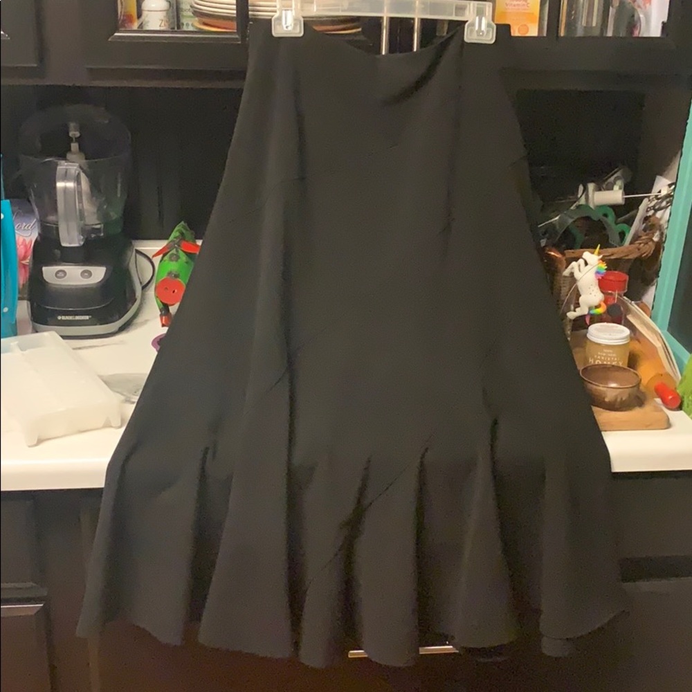 Darjoni Long black skirt. Side zip. wide at bottom